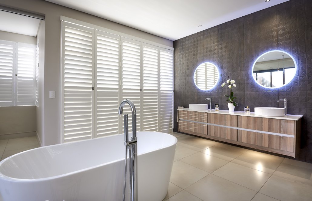 Solid timber wooden shutters installed in a South African living room