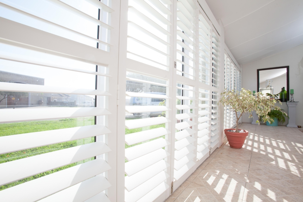 White Shutters: Summer’s Perfect Window Treatment white plantation shutters in South African home